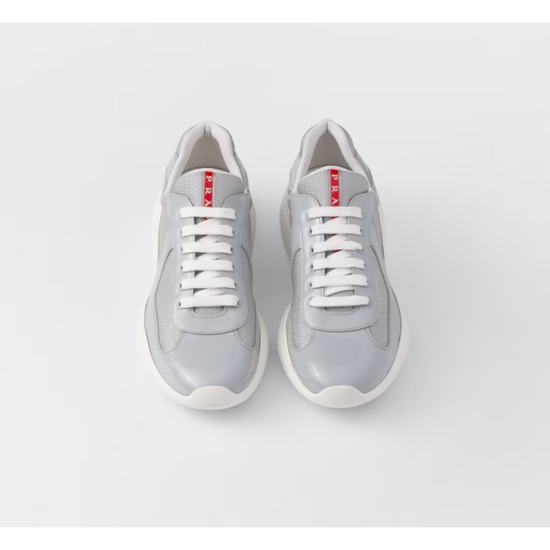 Sneakers Prada America’s Cup en cuir verni et tissu technique
